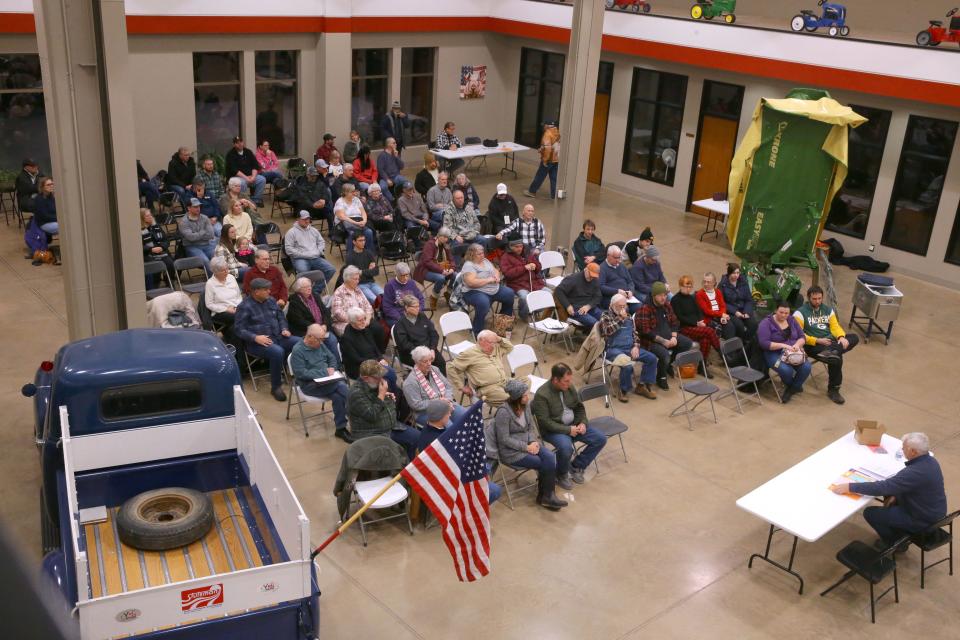 Iowans participate in the caucus Monday, Jan. 15, 2024 at Stutsman agricultural products in Hills, Iowa.