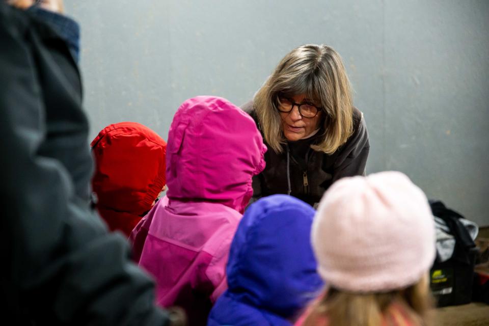 Mary Rottschafer, executive director of Critter Barn, answers questions from the crowd during a demonstration on sheep shearing Tuesday, Feb. 8.