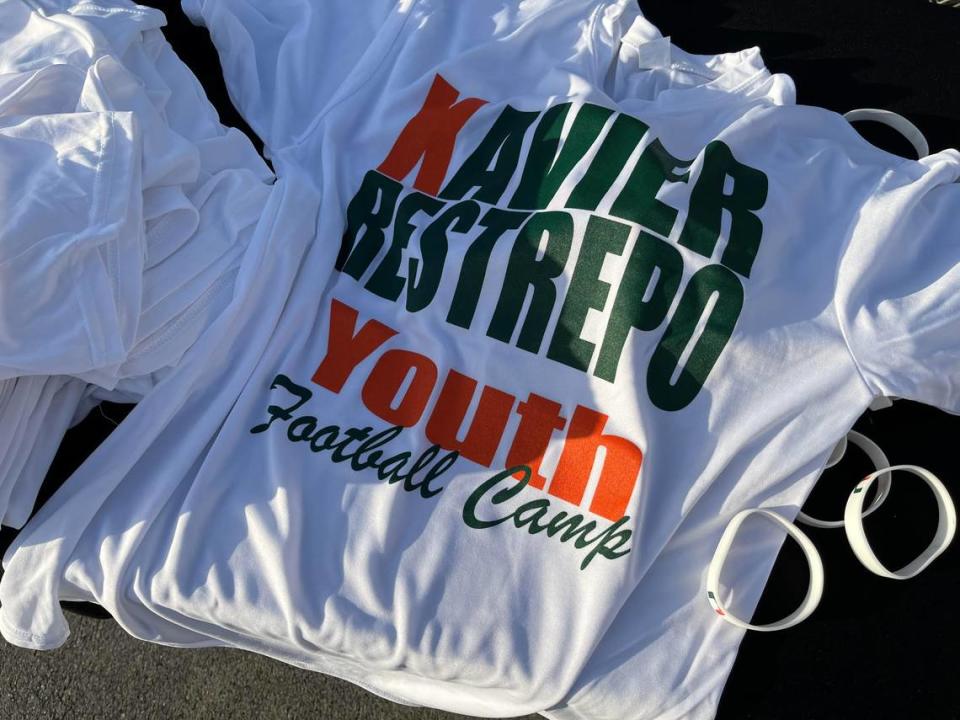 Each youngster at the Xavier Restrepo Youth Football Camp got a free T-shirt, sponsored by CanesWear in Davie