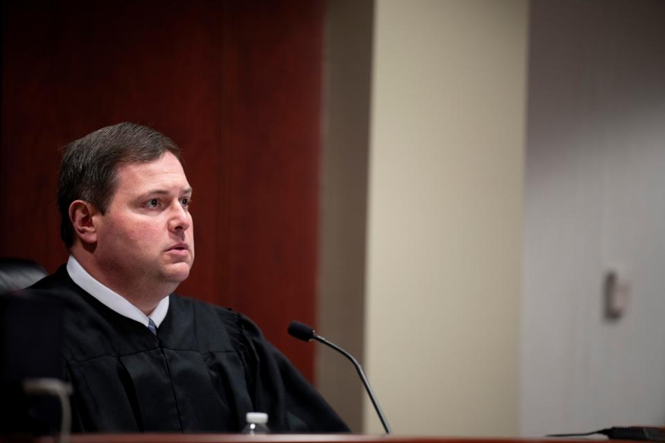 Judge Daniel Haughey speaks during the sentencing of John Carter for the disappearance and death of his daughter, Katelyn Markham, at the Butler County Courthouse in Hamilton, Ohio, on Thursday.