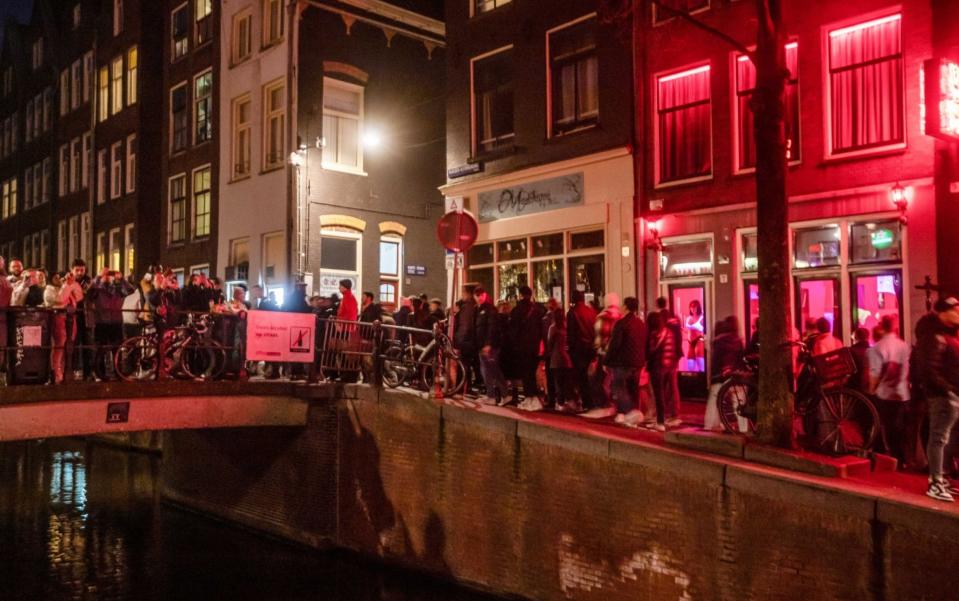 Tourists in the red light district of Amsterdam, Netherlands