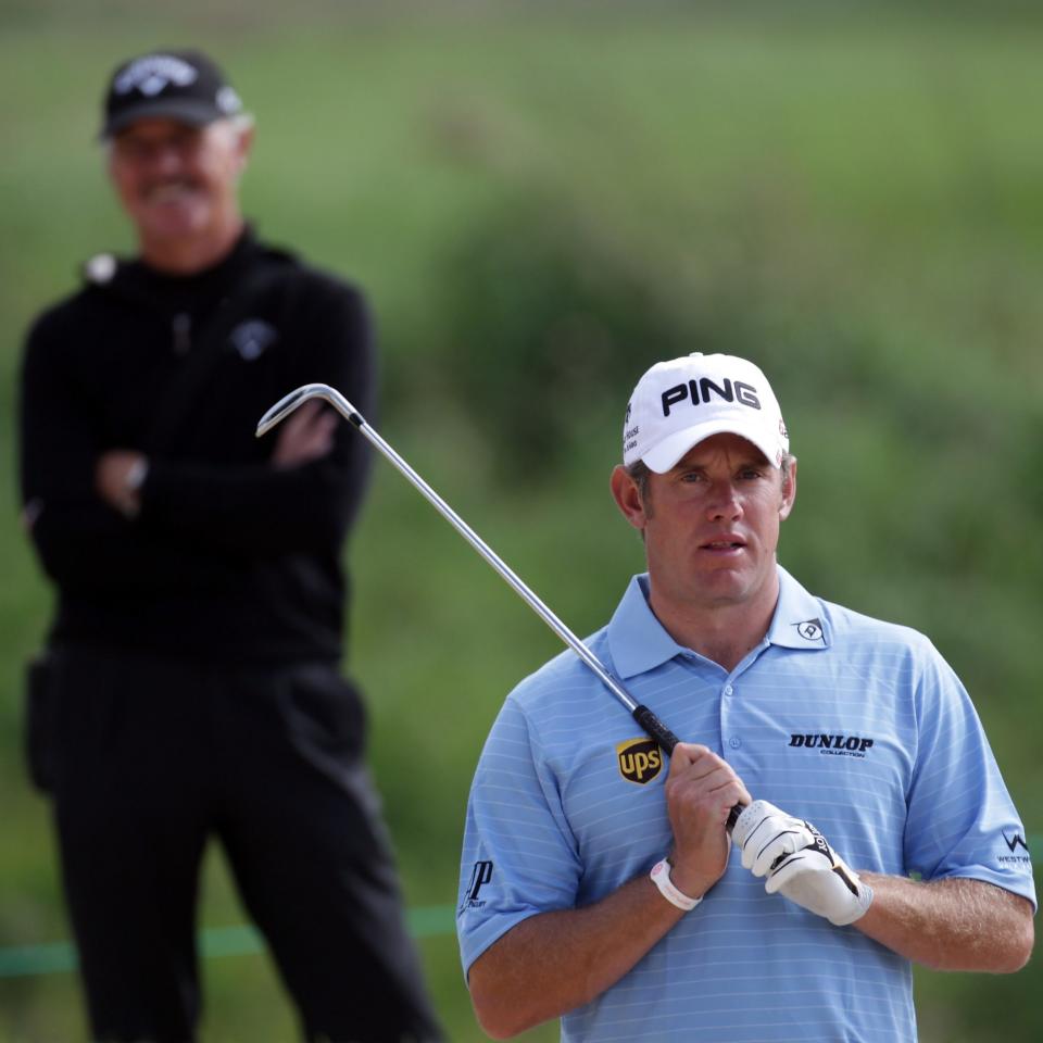 Lee Westwood of England watched by his coach Pete Cowen - Credit: Getty Images