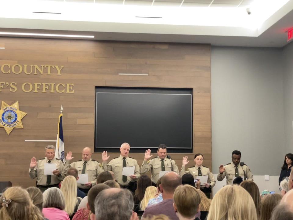 With family and friends watching, five new members of the Polk County Sheriff's Office took their oath at a ceremony June 24.