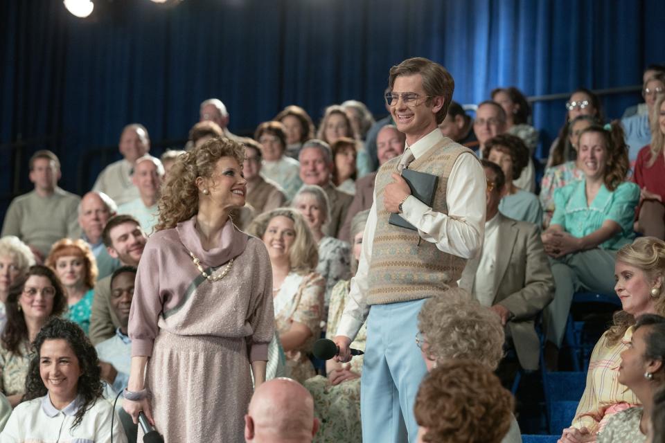 Jessica Chastain and Andrew Garfield stand together in a crowd