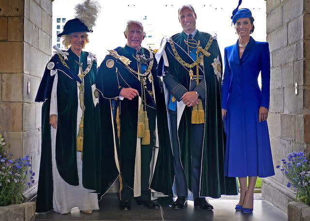 <p>YUI MOK/POOL/AFP via Getty </p> Britain's Queen Camilla, Britain's King Charles III, Britain's Prince William, Prince of Wales and Britain's Catherine, Princess of Wales pose for a photograph after watching a fly-past by the British Royal Air Force's (RAF) aerobatic team, the "Red Arrows", from the Palace of Holyroodhouse, in Edinburgh on July 5, 2023