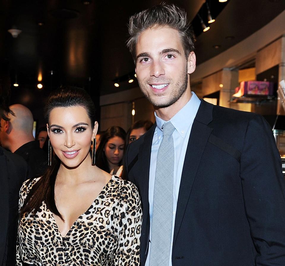 Kim Kardashian and Simon Huck during the grand opening of Kardashian Khaos at The Mirage Hotel and Casino on December 15, 2011 in Las Vegas, Nevada.