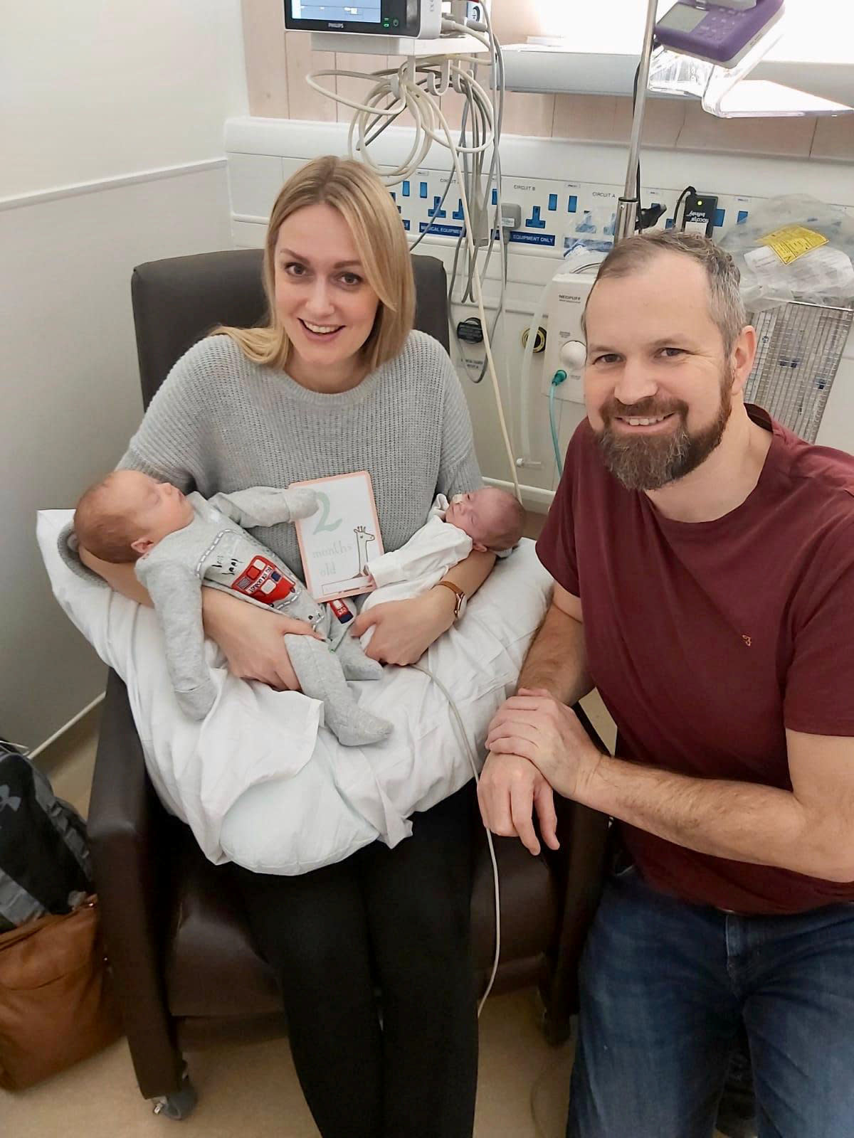 Rebecca Roberts and partner Rhys Weaver with their superfetation twins Noah and Rosalie.