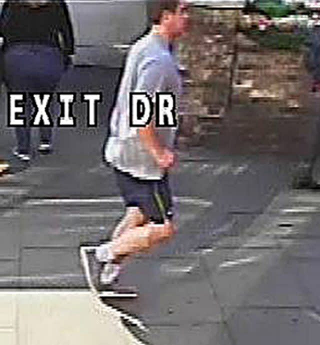 A suspect police wish to trace in relation to the assault of a woman who was pushed in front of a London bus