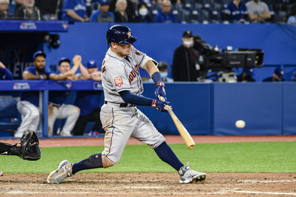 Houston Astros third baseman Alex Bregman bats during the eighth inning of the team's baseball game against the Toronto Blue Jays on Friday, April 29, 2022, in Toronto. Bregman struck out. (Christopher Katsarov/The Canadian Press via AP)