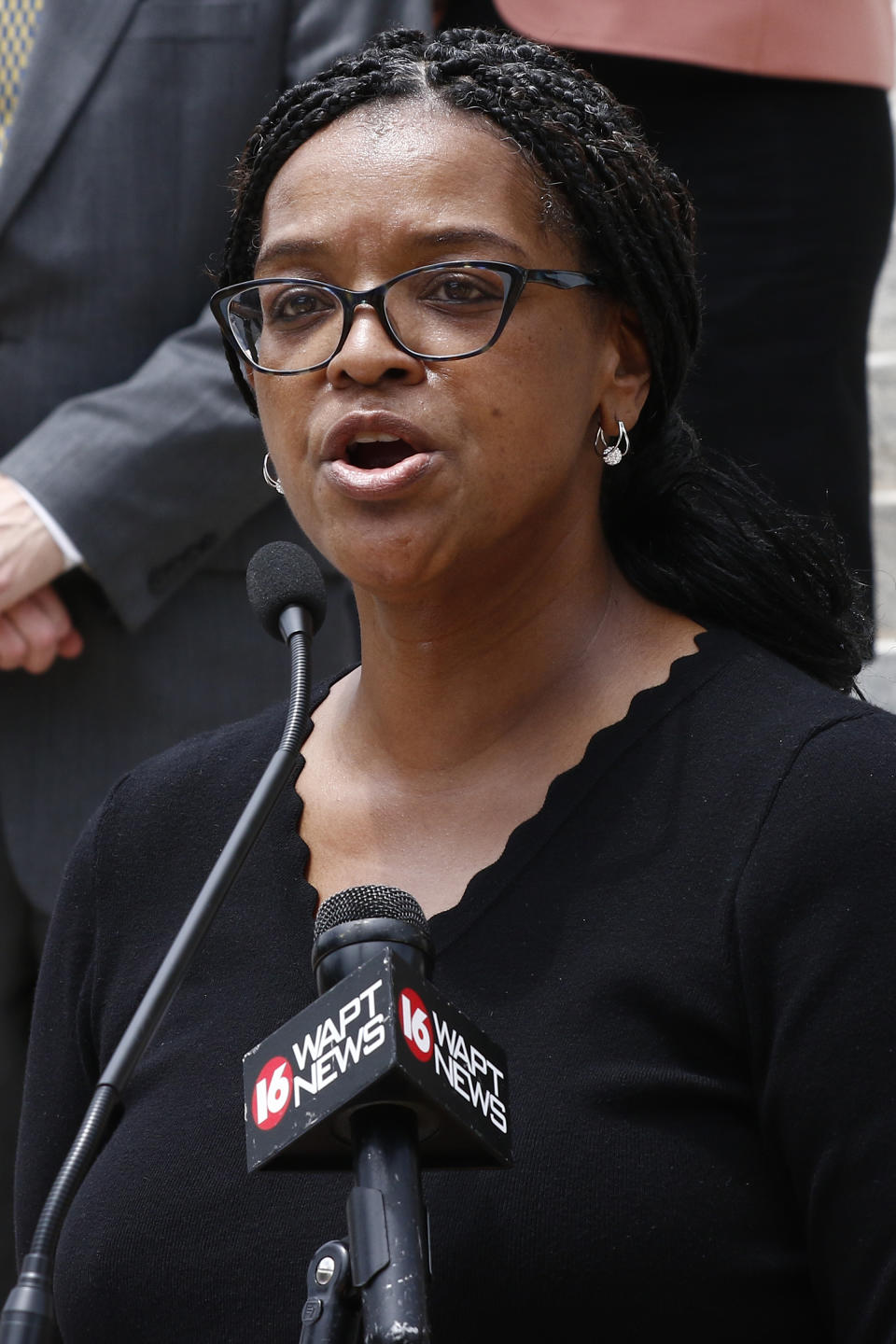 Sen. Angela Turner Ford, D-West Point, chairwoman of the Mississippi Legislative Black Caucus, expresses the group's approval of the passage by the Legislature of legislation to take down and replace the current state flag which contains the Confederate battle emblem, during a news conference at the Capitol in Jackson, Miss., Monday, June 29, 2020. (AP Photo/Rogelio V. Solis)