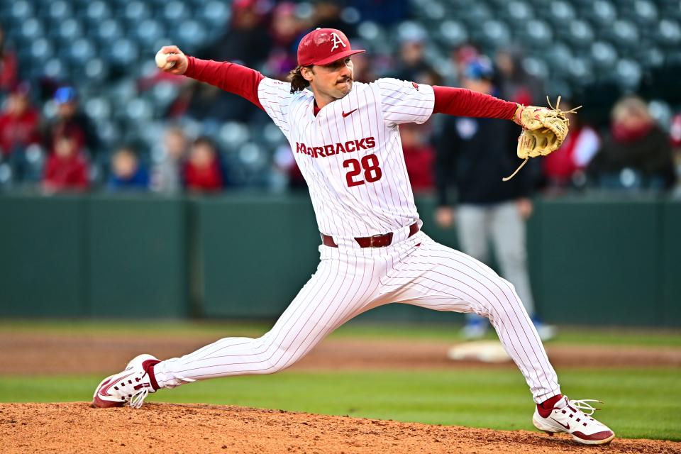 Arkansas baseball's Koty Frank fires a pitch during the Razorbacks' 18-5 win over McNeese State Saturday, March 9, 2024.