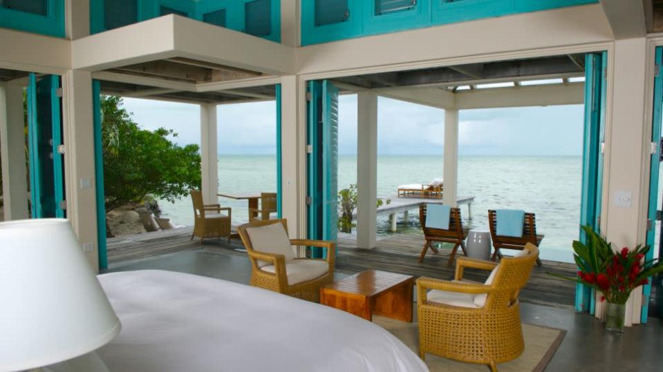 <b>NAME</b>: <a href="http://www.kiwicollection.com/hotel-detail/cayo-espanto" rel="nofollow noopener" target="_blank" data-ylk="slk:Cayo Espanto;elm:context_link;itc:0;sec:content-canvas" class="link ">Cayo Espanto</a><br><b>PLACE</b>: Cayo Espanto Island<br><b>PRICE</b>: CAD$1195<br><br>The private island retreat of Cayo Espanto was probably willed away from mainland Belize by the same, seaward looking vacationers. The private docks, snorkeling guests, and teeming reefs puncture the endless blue of the ocean, and provide something to watch during the staring episodes. Try kayaking or fly-fishing when you're ready to get into the water. (Image courtesy of <a href="http://www.kiwicollection.com/" rel="nofollow noopener" target="_blank" data-ylk="slk:Kiwi Collection;elm:context_link;itc:0;sec:content-canvas" class="link ">Kiwi Collection</a>.)