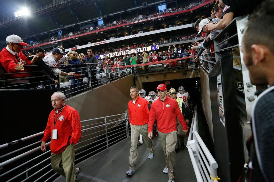 Ohio State Buckeyes head coach Urban Meyer takes the field prior to the Battlefrog Fiesta Bowl against the Notre Dame Fighting Irish at University of Phoenix Stadium in Glendale, Arizona on Jan. 1, 2016.