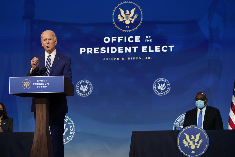 President-elect Joe Biden speaks during an event to announce his choice of retired Army Gen. Lloyd Austin, right, to be secretary of defense, at The Queen theater in Wilmington, Delaware, on Dec. 9. (Photo: AP Photo/Susan Walsh)