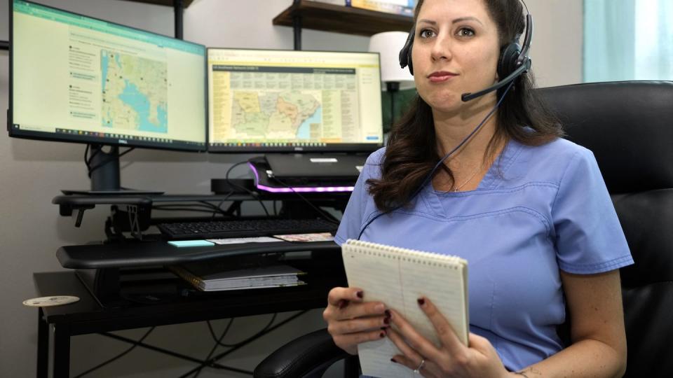 Nicole Leger works from her home office Friday, Aug. 4, 2023, in Lithia, Fla. (Chris O'Meara/AP)