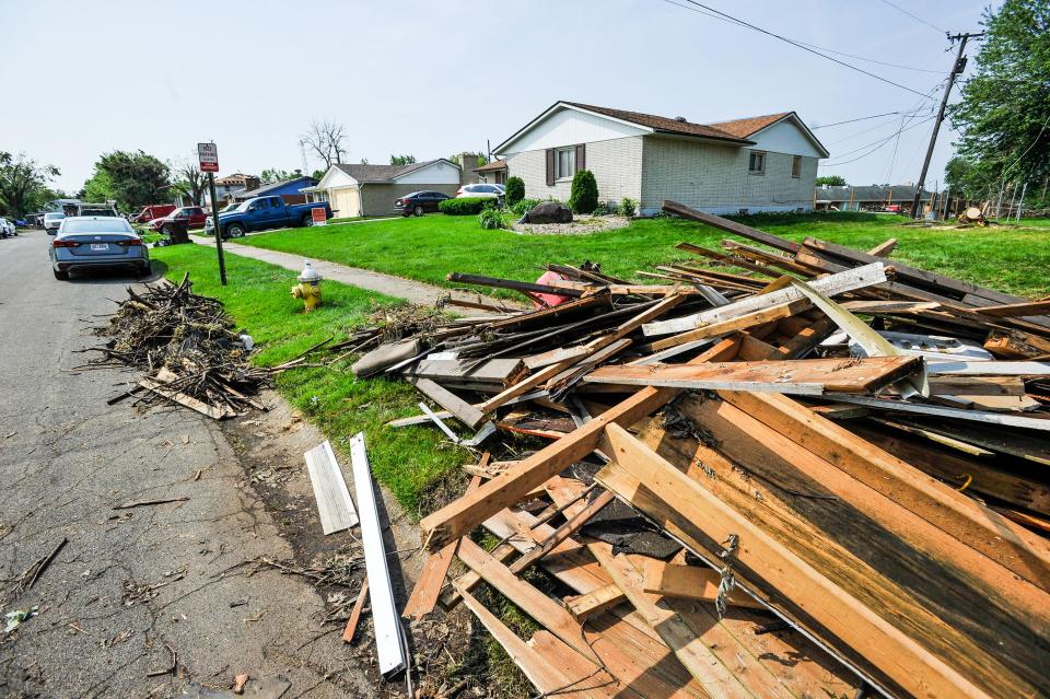 Volunteer groups and residents worked together Saturday, June 1 to clear debris from some of the neighborhoods in Trotwood and other areas hit by the tornado. (WHIO File)