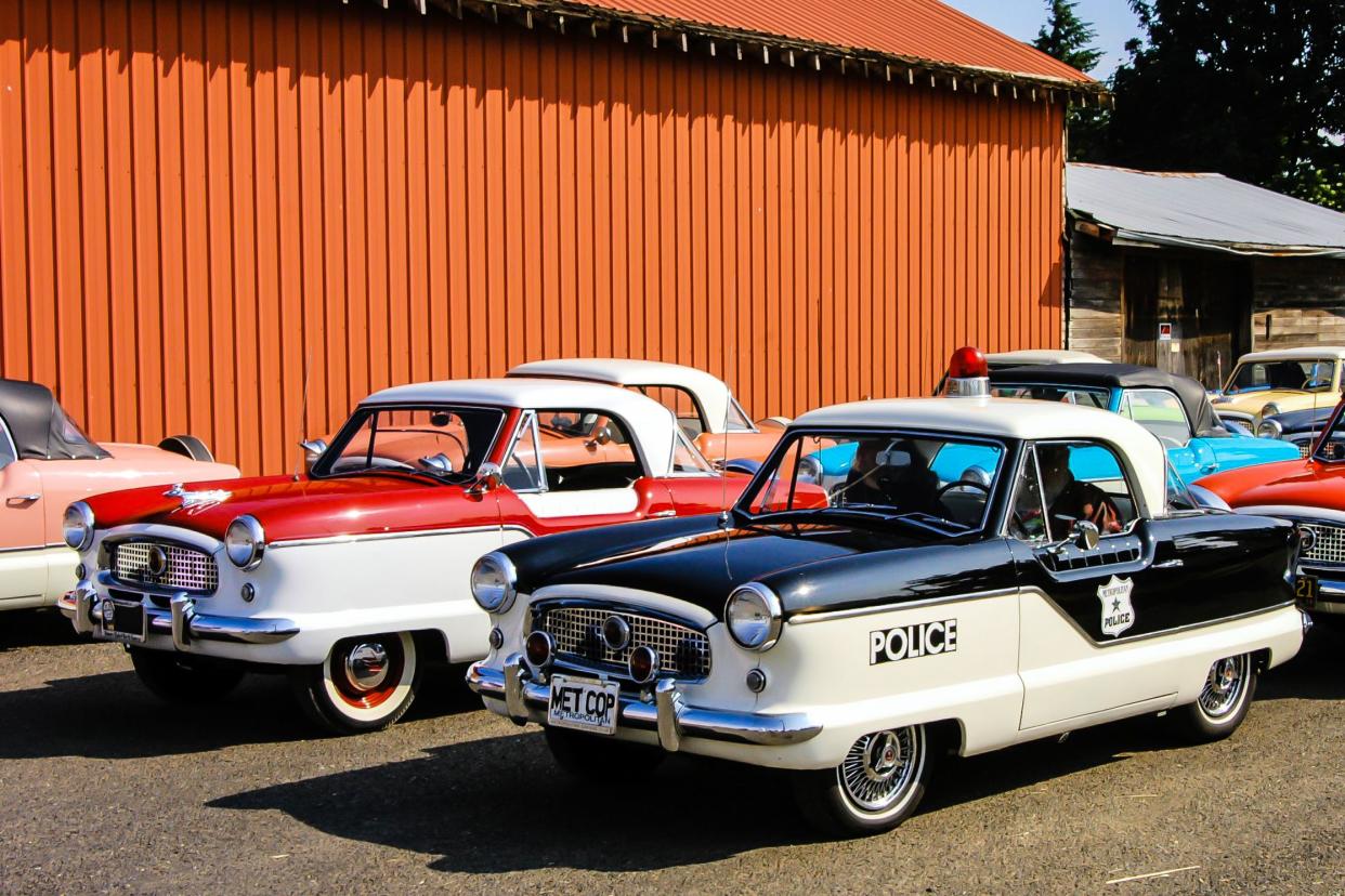 Castle Rock, Washington, United States - July 19, 2008: A Nash Metropolitan restored and configured as a police car