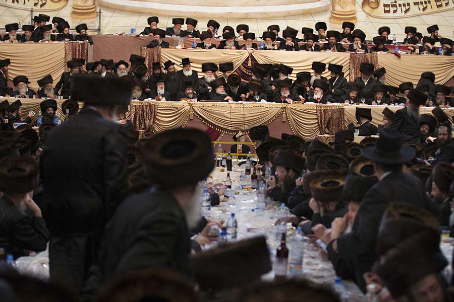 <div class="caption-credit"> Photo by: Getty Images</div>The ceremony was several hours long, lasting until dawn. Guests dressed in traditional clothing, and men and women sat separately.