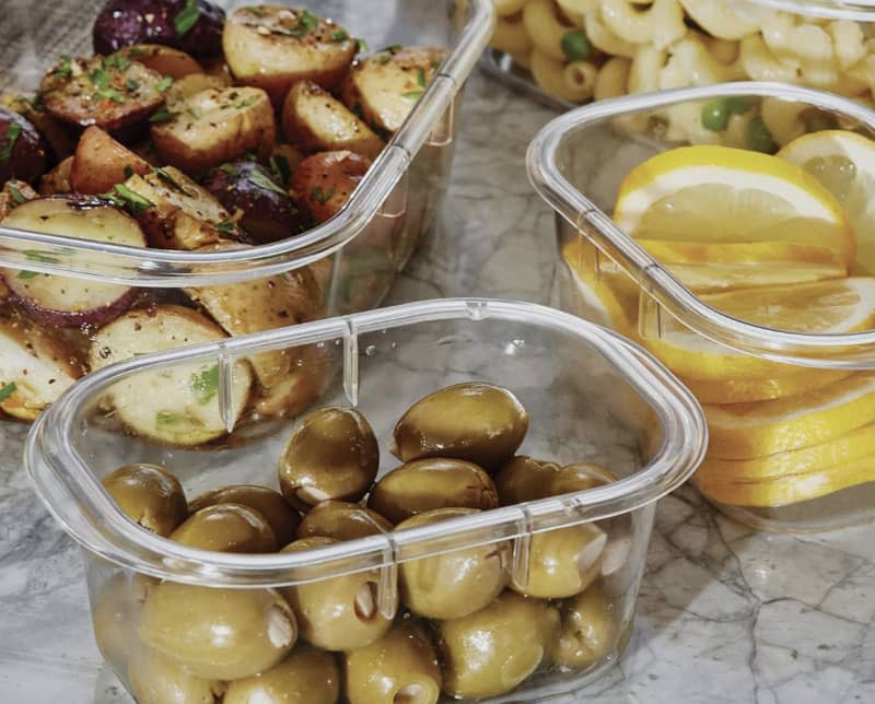 glass Food Storage Containers holding lemons, olives, and potatoes