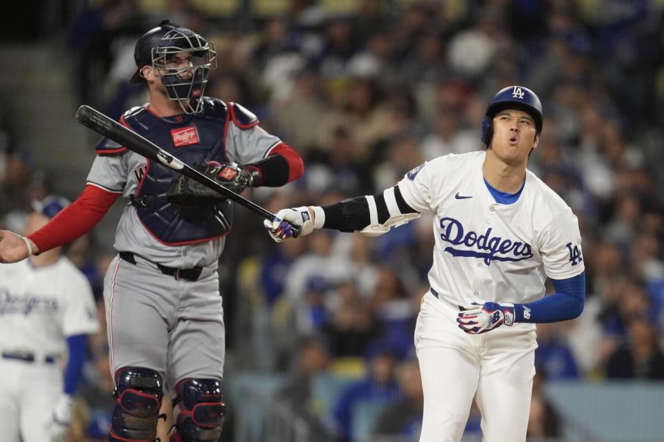 Shohei Ohtani reacting to a missed swing