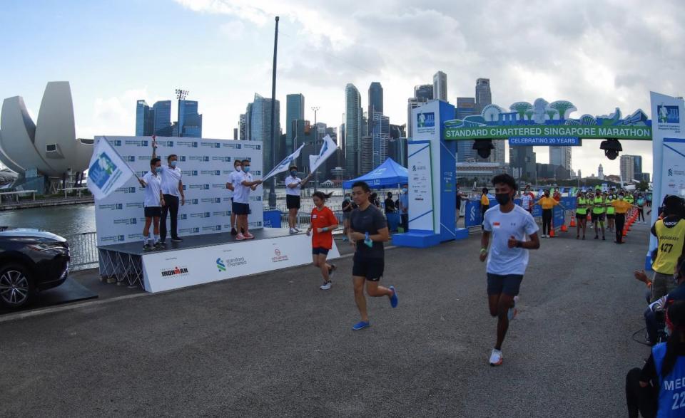 Runners at the 5km category of the Standard Chartered Singapore Marathon 2021 being flagged off at Marina Bay. (PHOTO: IRONMAN Group)