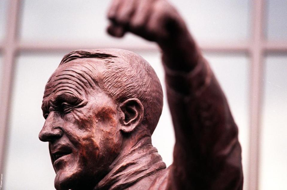 The bronze statue of Bill Shankly stands outside of The Kop at Anfield.