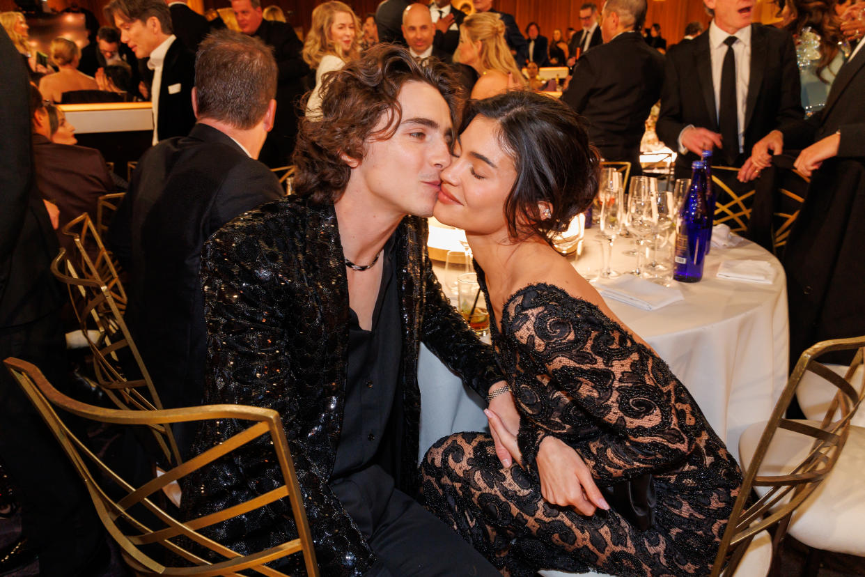 Timothée Chalamet and Kylie Jenner share a close moment at their table at the Golden Globes.