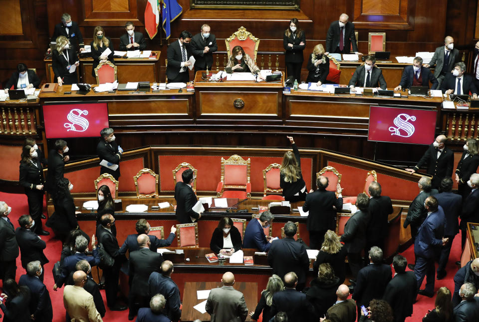 A general view of the upper house of parliament at the Senate after a confidence vote, in Rome, Tuesday, Jan. 19, 2021. Italian Premier Giuseppe Conte fights for his political life with an address aimed at shoring up support for his government, which has come under fire from former Premier Matteo Renzi's tiny but key Italia Viva (Italy Alive) party over plans to relaunch the pandemic-ravaged economy. (Yara Nardi/pool photo via AP)