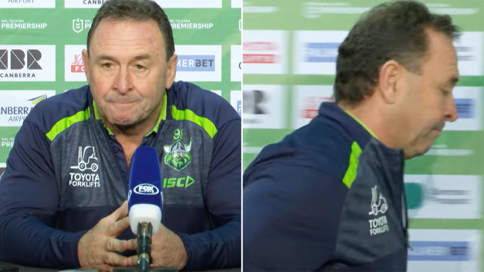 Ricky Stuart is pictured walking out of a press conference.