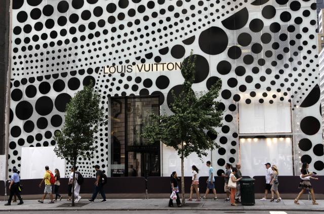 10 July 2012 - New York - A wax figure of Japanese artist Yayoi Kusama goes  on display at the Louis Vuitton And Yayoi Kusama Collaboration Unveiling at Louis  Vuitton flagship store