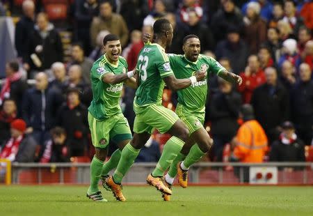 Football Soccer - Liverpool v Sunderland - Barclays Premier League - Anfield - 6/2/16 Jermain Defoe celebrates scoring the second goal for Sunderland with Lamine Kone Action Images via Reuters / Carl Recine Livepic