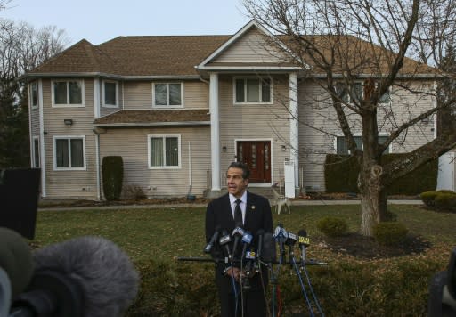 New York Governor Andrew Cuomo speaks to the media outside the home of Rabbi Chaim Rottenberg where the Hanukkah machete attack occurred