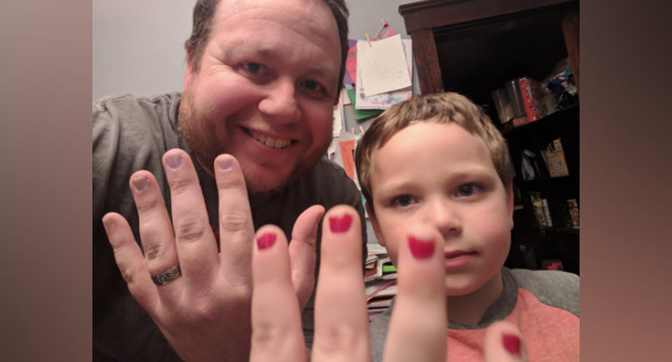 'Daddy blogger' Aaron Gouveia (left) and son Sam (right) wearing nail polish in a photograph posted on his Twitter account Daddy Files.