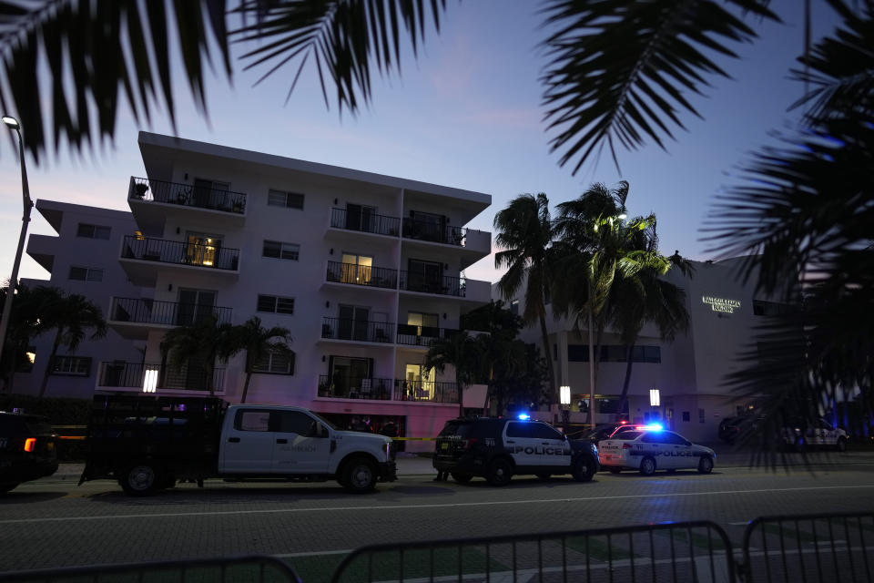 Security guards stand watch during an event commemorating Kristallnacht, the 1938 government-backed pogroms against Jews in Germany and Austria, at the Holocaust Memorial in Miami Beach, Fla., Sunday, Nov. 5, 2023. (AP Photo/Rebecca Blackwell)