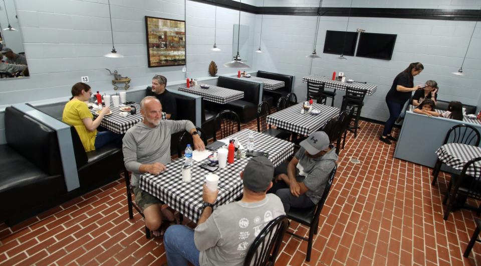 Customers enjoy the food at Carolina Kitchen on Campbell Street in Shelby Thursday morning, May 16, 2024.