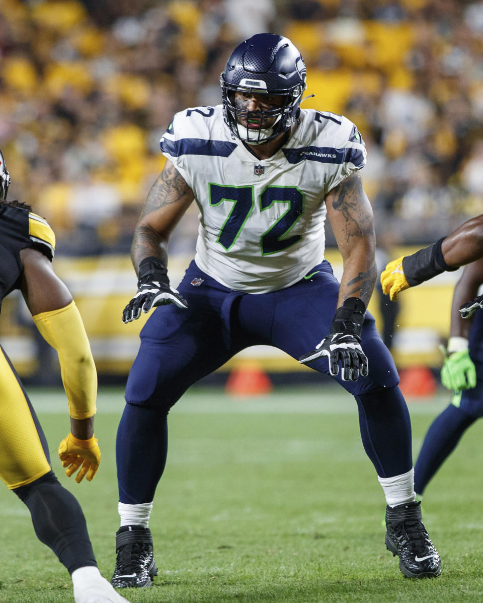 FILE - Seattle Seahawks offensive tackle Abraham Lucas (72) blocks during a preseason NFL football game against the Pittsburgh Steelers, Saturday, Aug. 13, 2022, in Pittsburgh, Pa. Charles Cross and Abe Lucas were drafted to be the bookends to the Seattle Seahawks offensive now and in the future. (AP Photo/Matt Durisko, File)