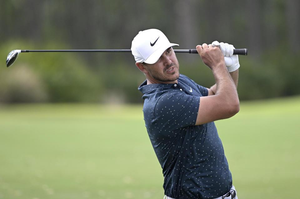 Brooks Koepka hits from the seventh fairway during the final round of the Workday Championship golf tournament Sunday, Feb. 28, 2021, in Bradenton, Fla. (AP Photo/Phelan M. Ebenhack)