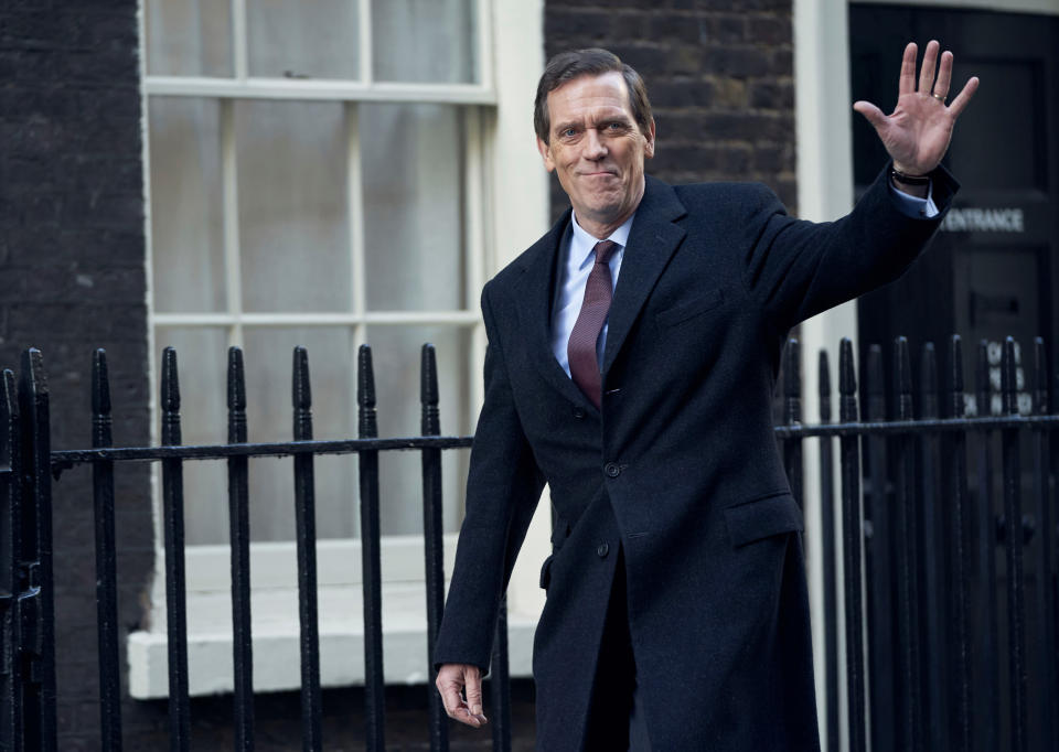 This image released by PBS shows Hugh Laurie as a heedless British politician beset by scandal in the four-episode series "Roadkill," premiering on MASTERPIECE, Sunday, Nov. 1, 2020 on PBS. (MASTERPIECE/PBS via AP)