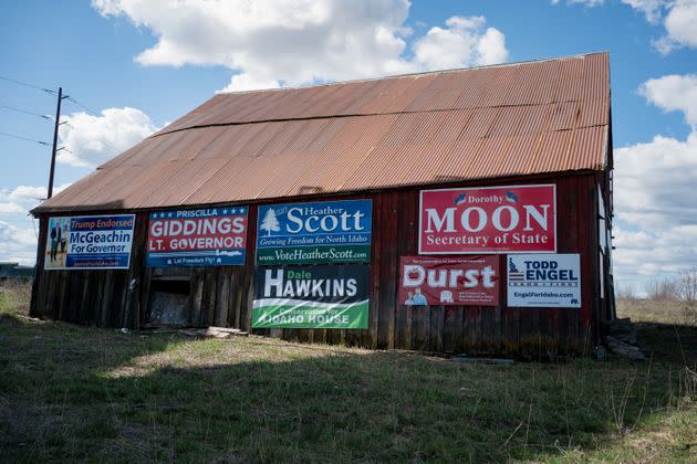 A barn near Coeur d'Alene, Idaho, on March 30, 2022, covered in signs for far-right candidates in the upcoming Republican primary. (Photo: Margaret Albaugh for HuffPost)