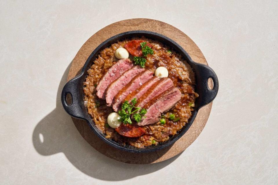 Arroz de pato or “ducked rice” with smoked bacon, chorizo and parsley aioli at Sereia restaurant in Coconut Grove.