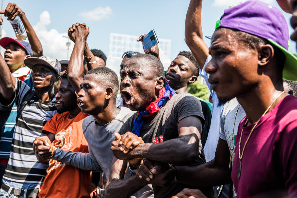 Demonstrators take part in a Voodoo ceremony before marching in the protest demanding the resignation of President Jovenel MoÃ¯se in Port-au-Prince on October 17, 2019. (Photo by VALERIE BAERISWYL/AFP via Getty Images)