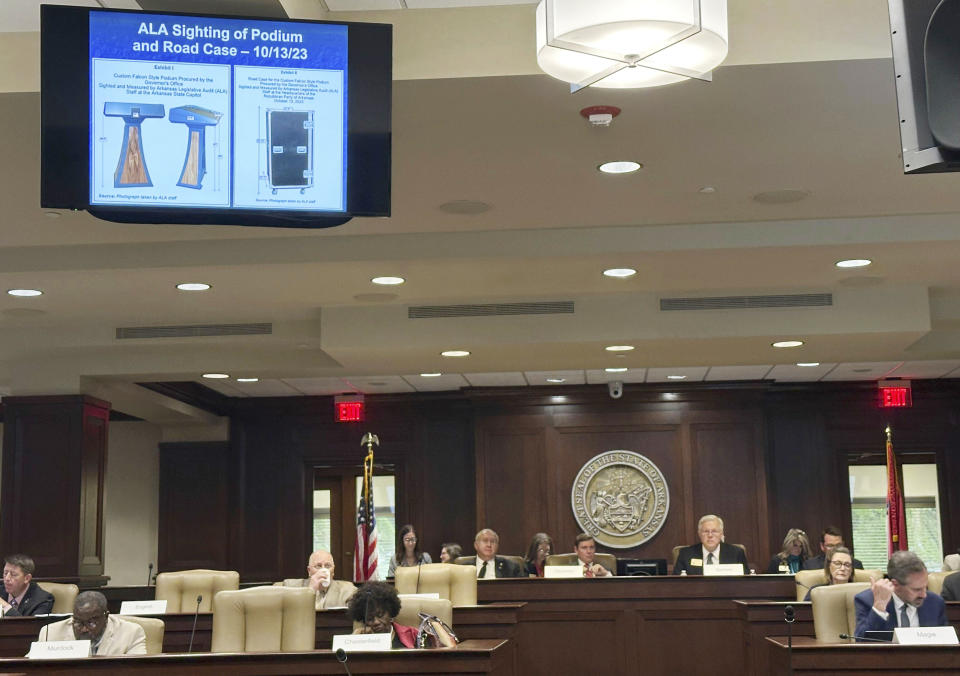 An Arkansas legislative committee hears a report on Tuesday, April 16, 2024, at the Arkansas state Capitol complex in Little Rock, Ark., about the audit of a $19,000 lectern purchased for Gov. Sarah Huckabee Sanders. (AP Photo/Andrew DeMillo)