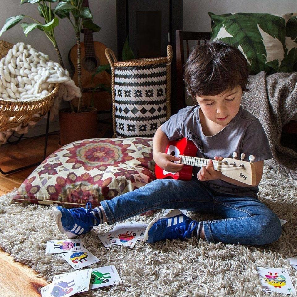 Start teaching your little punk kid the entire Ramones catalog. This toy comes with flashcards of chord diagrams and full access to the Loog Guitar app. Hey! Ho! Let's go!<br /><br /><strong>Promising review:</strong> "My daughter and I learning how to play the guitar together. Even if we don't become rock stars the quality time we are spending together is all the justification I needed to make the purchase. The strings are perfect for her little fingers." &mdash; <a href="https://amzn.to/3xhvCWC" target="_blank" rel="noopener noreferrer">JSpriggins</a>﻿<br /><strong><br />Get it from Amazon for <a href="https://amzn.to/3xhvCWC" target="_blank" rel="noopener noreferrer">$79</a> (available in six colors).</strong>