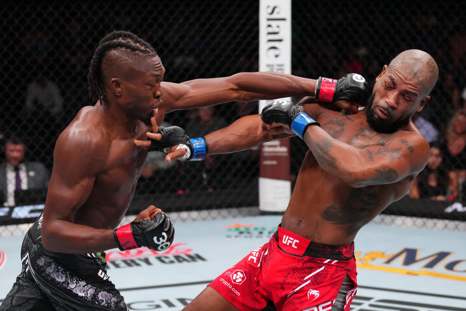 AUSTIN, TEXAS - DECEMBER 02: (L-R) Jalin Turner punches Bobby Green in a lightweight fight during the UFC Fight Night event at Moody Center on December 02, 2023 in Austin, Texas. (Photo by Josh Hedges/Zuffa LLC via Getty Images)