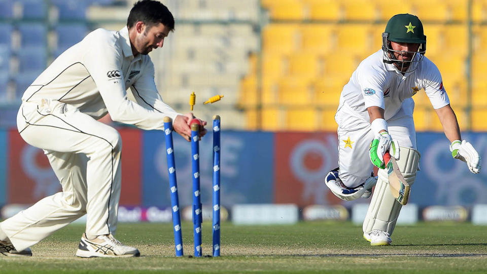 Yasir Shah was run out in comical fashion. (Photo by AAMIR QURESHI / AFP / Getty Images)