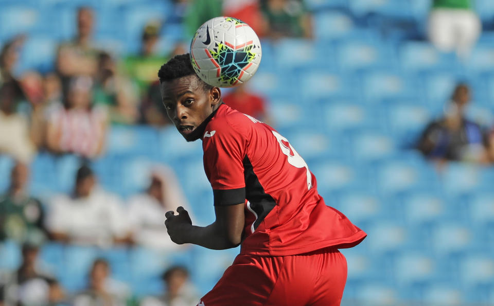 Cuba's Maykel Reyes (9) chases the ball against Canada during the first half of their CONCACAF Golf Cup soccer match in Charlotte, N.C., Sunday, June 23, 2019. (AP Photo/Chuck Burton)