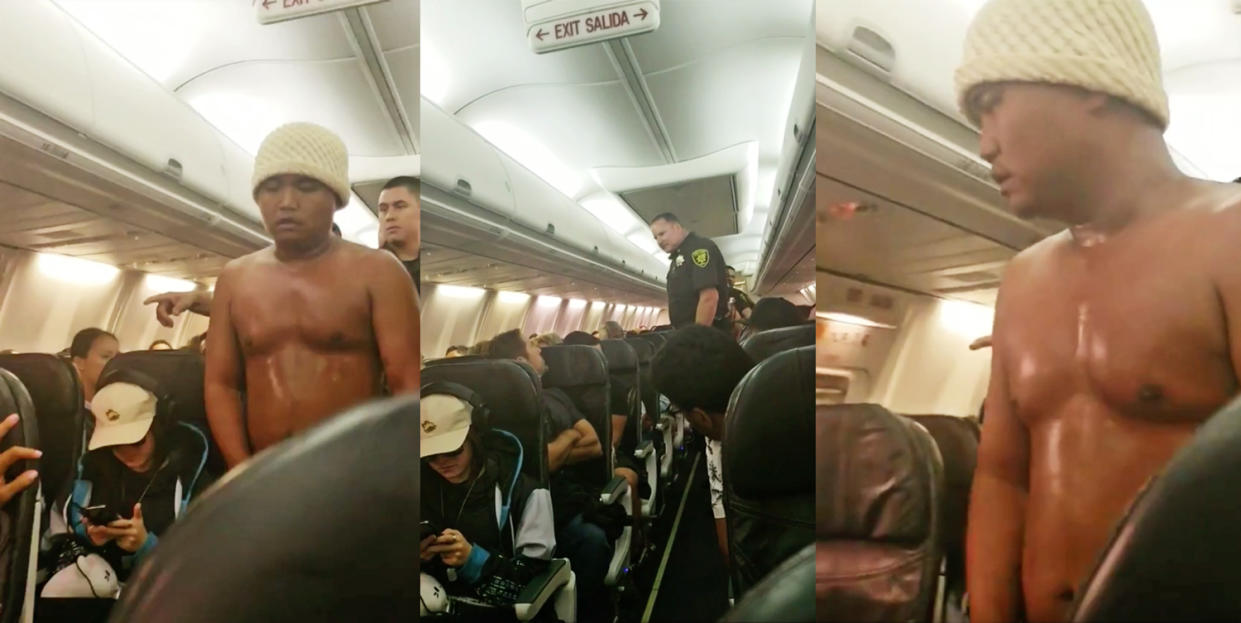 A man got escorted off a plane after emerging from the restroom covered in a liquid. (Photo: YouTube)