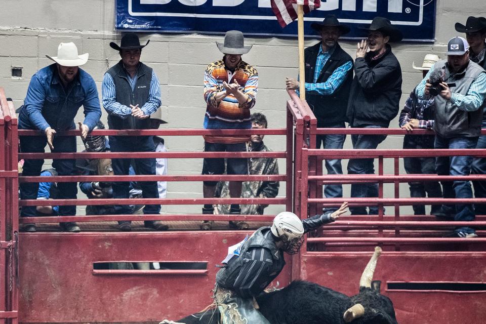 Fans watch as a bull rider competes in last year's Cody Nance Invitational.