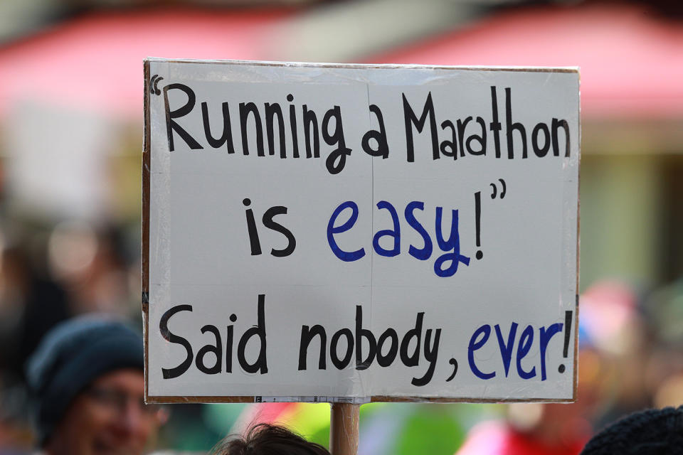 A spectator holds up a sign supporting runners during the New York City Marathon. (Photo: Gordon Donovan/Yahoo News)