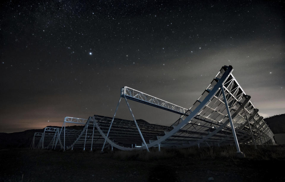 CORRECTS TO NOV. 4 NOT NOV. 5 - This November 2016 photo provided by the Canadian Hydrogen Intensity Mapping Experiment collaboration shows the CHIME radio telescope at the Dominion Radio Astrophysical Observatory in Kaleden, British Columbia, Canada. On Wednesday, Nov. 4, 2020, astronomers say they used the instrument to trace an April 2020 fast cosmic radio burst to our own galaxy and a type of powerful energetic young star called a magnetar. The burst was also detected by a California doctoral student’s set of handmade antennas. (Andre Renard/University of Toronto via AP)